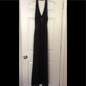 De Laru front split full length halter dress.